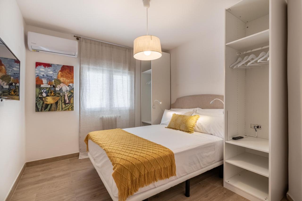 Bns Triunfo Centro Suites Granada Bagian luar foto