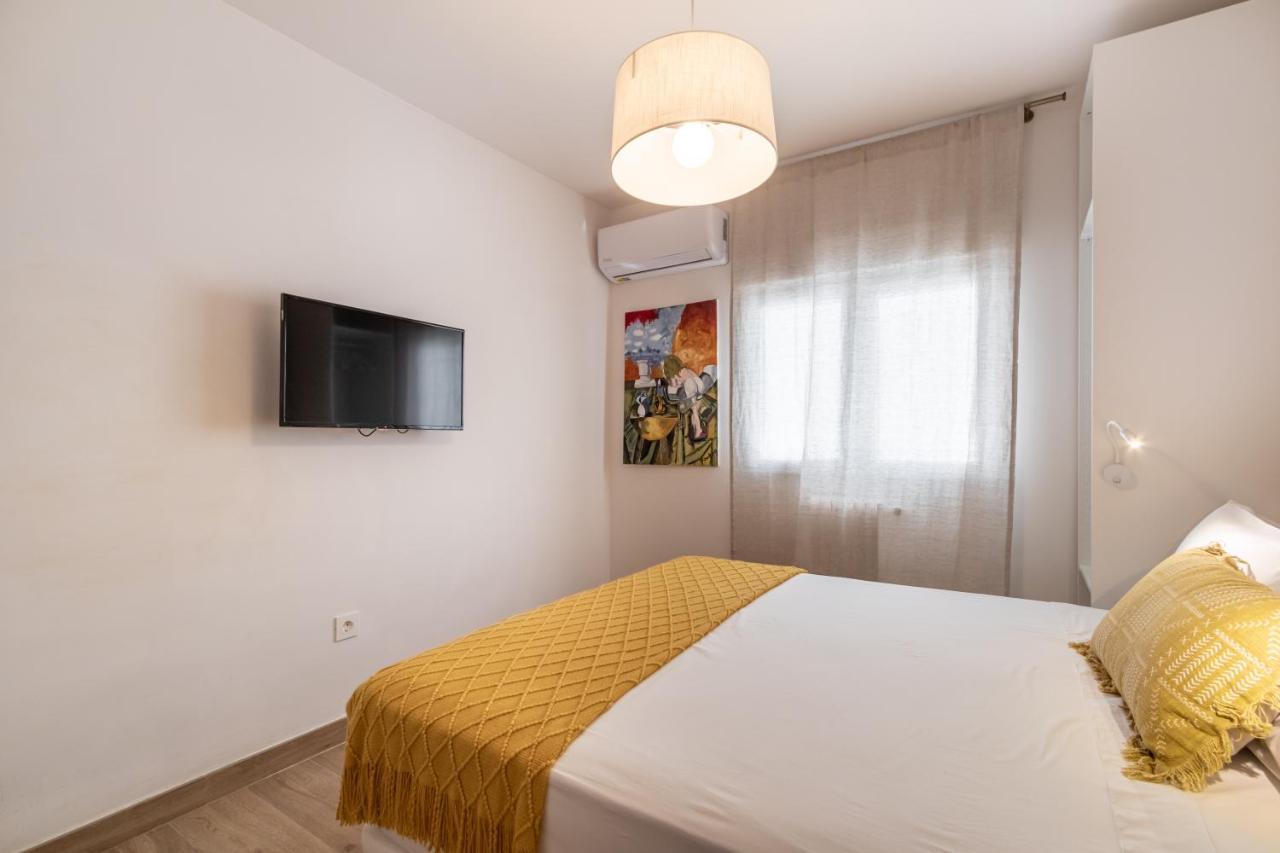 Bns Triunfo Centro Suites Granada Bagian luar foto