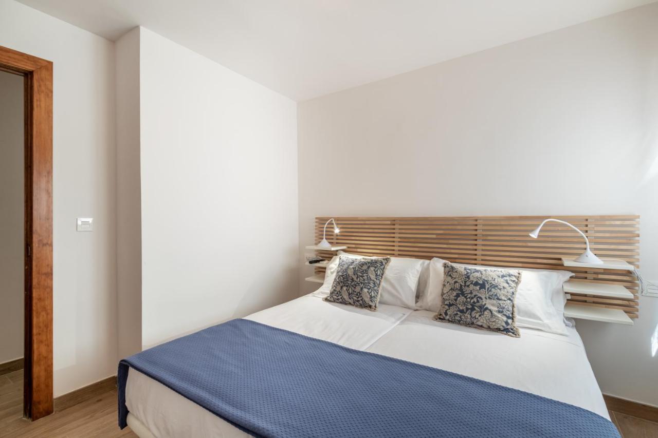 Bns Triunfo Centro Suites Granada Bagian luar foto