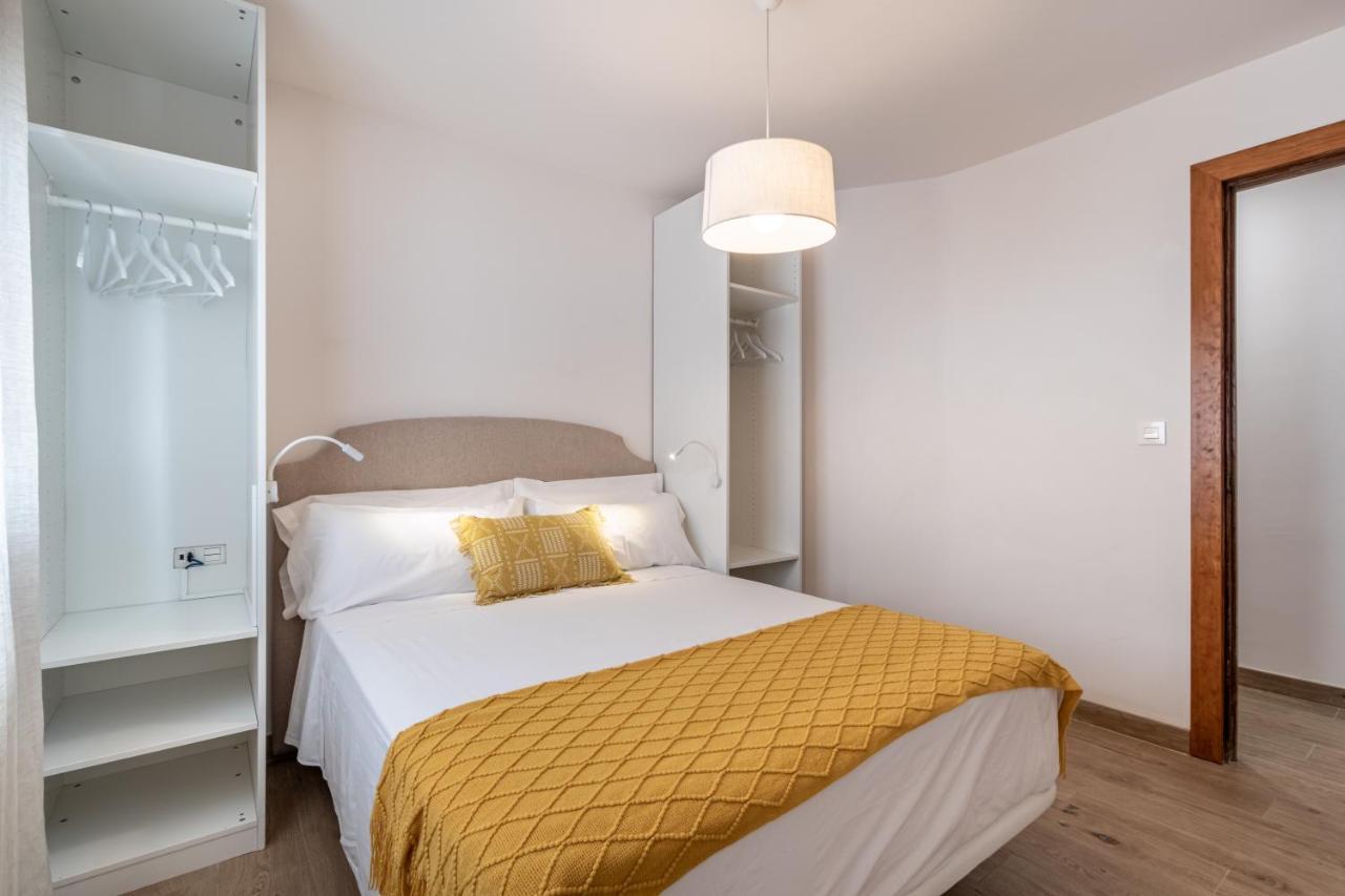 Bns Triunfo Centro Suites Granada Bagian luar foto